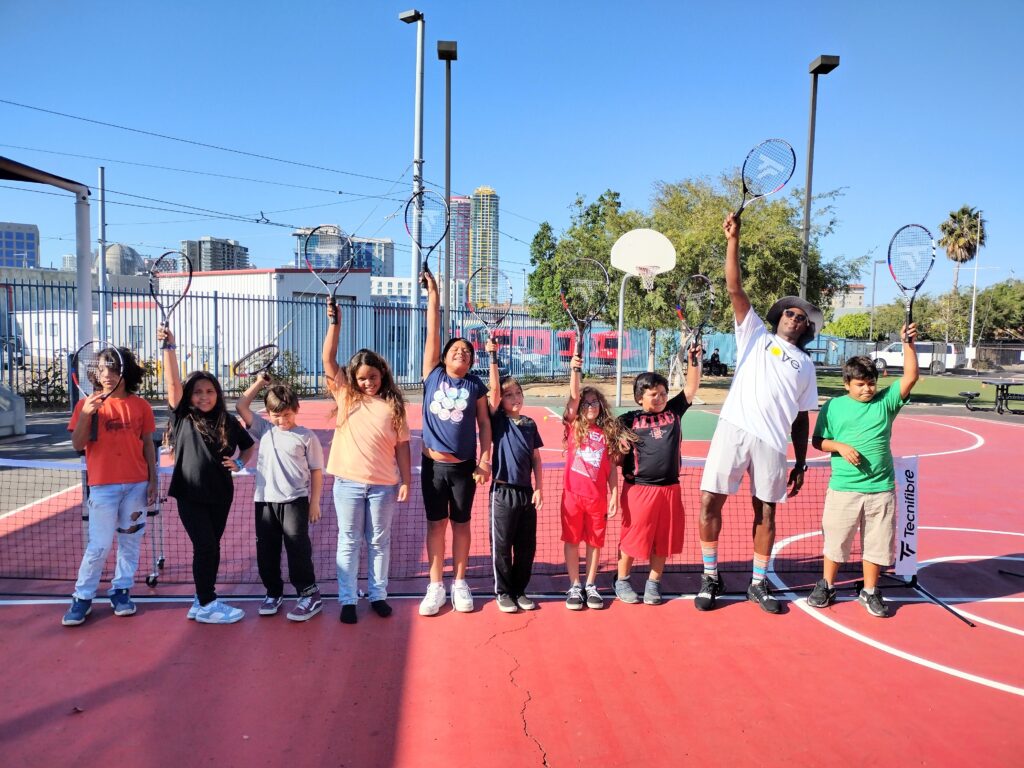 Children at Youth Tennis San Diego on track